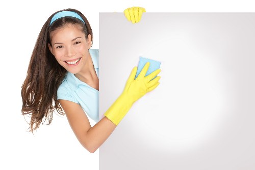 Cleaners Surrey team performing deep cleaning in a kitchen